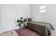 Compact bedroom with a clean look and ample natural light at 1519 E 29Th Ave, Denver, CO 80205