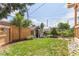 Spacious backyard featuring green grass and a small shed at 3325 Irving St, Denver, CO 80211