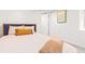 Cozy bedroom with comfortable bed and minimalist decor at 3325 Irving St, Denver, CO 80211