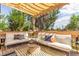 Relax on this inviting deck with comfortable seating and a stylish striped rug at 3325 Irving St, Denver, CO 80211