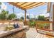 Stylish covered deck with comfortable seating, perfect for entertaining or relaxing at 3325 Irving St, Denver, CO 80211