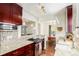 Bright kitchen features a breakfast nook, granite countertops, and pendant lighting at 3325 Irving St, Denver, CO 80211