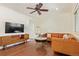 Cozy living room featuring modern furnishings, hardwood floors, and ample natural light at 3325 Irving St, Denver, CO 80211