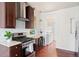 Well-equipped kitchen featuring stainless steel appliances, granite countertops, and ample cabinet space at 3438 N York St, Denver, CO 80205