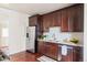 Spacious kitchen featuring stainless steel appliances and elegant cabinets at 3438 N York St, Denver, CO 80205