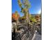 Charming balcony featuring stylish chairs and a small table with an umbrella at 377 Pearl St # 5, Boulder, CO 80302