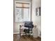Cozy corner with gray upholstered chair and views out the window at 377 Pearl St # 5, Boulder, CO 80302