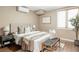 Comfortable bedroom with neutral decor, a large window, and stylish bench at 377 Pearl St # 5, Boulder, CO 80302