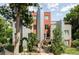 Modern multi-story home with unique architectural details, landscaping, and private gated yard at 377 Pearl St # 5, Boulder, CO 80302