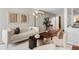Bright living room features hardwood floors, white sofa, modern lighting, and stylish decor at 377 Pearl St # 5, Boulder, CO 80302