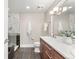 Contemporary bathroom featuring a glass shower, sleek fixtures, and a spacious vanity at 2001 Lincoln St # 2524, Denver, CO 80202