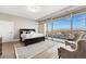 Bright bedroom featuring floor-to-ceiling windows showcasing city views and modern decor at 2001 Lincoln St # 2524, Denver, CO 80202