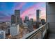 Panoramic city view at sunset showcasing the impressive architecture and vibrant city lights at 2001 Lincoln St # 2524, Denver, CO 80202