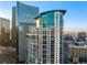 Modern high-rise condo building showcasing curved architecture, glass windows, and multiple balconies at 2001 Lincoln St # 2524, Denver, CO 80202