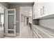 Hallway showcasing luxurious marble floors and built-in shelving at 2001 Lincoln St # 2524, Denver, CO 80202