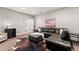 Relaxing living room showcasing a leather sectional, decorative accents, and modern lighting at 2001 Lincoln St # 2524, Denver, CO 80202