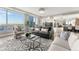 Bright and airy living room featuring floor-to-ceiling windows and city views at 2001 Lincoln St # 2524, Denver, CO 80202