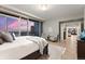 Serene bedroom with city views, comfortable furnishings, and ample natural light for a relaxing atmosphere at 2001 Lincoln St # 2524, Denver, CO 80202
