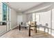 Bright office space with a modern desk, city views through the glass door, and ample natural light at 2001 Lincoln St # 2524, Denver, CO 80202