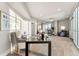 Spacious office area with city views, a glass-topped desk, and comfortable seating for a productive work environment at 2001 Lincoln St # 2524, Denver, CO 80202
