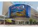 Modern city building with a large billboard advertising fall lodging deals and Motorola products at 2001 Lincoln St # 2524, Denver, CO 80202