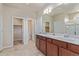 Bright bathroom features double sinks with tile floors and lots of counter space at 1226 S Fulton St, Aurora, CO 80247