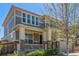 Charming two-story home with a covered porch and attractive stone accents at 1226 S Fulton St, Aurora, CO 80247