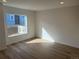 Living room with modern flooring and a bright window at 1315 N Alton St, Aurora, CO 80010