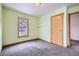 Bedroom with carpet, window, and closet at 1438 Marion St, Georgetown, CO 80444