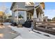 Covered patio with grill and fenced backyard at 16935 Buffalo Valley Path, Monument, CO 80132