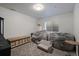 Finished basement with comfy seating and ample storage at 16935 Buffalo Valley Path, Monument, CO 80132