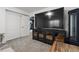 Finished basement with large TV, storage and access to gym at 16935 Buffalo Valley Path, Monument, CO 80132