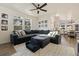 Large living room with sectional sofa, view into dining area and kitchen at 16935 Buffalo Valley Path, Monument, CO 80132