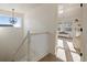 Upstairs hall with access to bedrooms and a loft area at 16935 Buffalo Valley Path, Monument, CO 80132