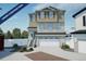 Charming two-story home featuring a two-car garage and landscaped front yard under construction at 22033 E 38Th Pl, Aurora, CO 80019