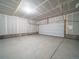 Unfinished garage with sealed concrete flooring and ready for customization at 22033 E 38Th Pl, Aurora, CO 80019