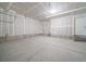 Unfinished two car garage with sealed concrete floor at 22033 E 38Th Pl, Aurora, CO 80019