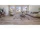 Comfortable living room featuring lots of natural light, contemporary decor, and open space at 22033 E 38Th Pl, Aurora, CO 80019