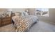 Inviting bedroom with a large window, soft carpet, and stylish decor at 22033 E 38Th Pl, Aurora, CO 80019