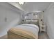 Cozy bedroom with neutral decor and carpet, featuring a comfortable bed and side tables at 2212 Ingalls St, Edgewater, CO 80214