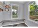 Cozy breakfast nook features built-in granite bench seating with ample natural light from windows at 2212 Ingalls St, Edgewater, CO 80214