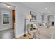 Comfortable living room with stylish decor and an open doorway view of the kitchen at 2212 Ingalls St, Edgewater, CO 80214