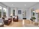 Spacious living room featuring hardwood floors and natural light at 2212 Ingalls St, Edgewater, CO 80214