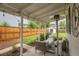 Covered patio with outdoor seating, perfect for entertaining and relaxation at 2212 Ingalls St, Edgewater, CO 80214