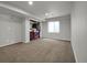 Finished basement area with carpet, window, and closet space, perfect for storage at 5283 Union Ct # 8, Arvada, CO 80002