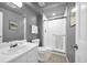 Bathroom featuring a shower, a vanity, and a commode, offering comfort and functionality at 5283 Union Ct # 8, Arvada, CO 80002