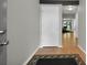 Inviting entryway with wood floors and neutral walls creating a bright and open space at 5283 Union Ct # 8, Arvada, CO 80002