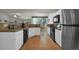 Well-equipped kitchen with sleek countertops and stainless steel appliances at 5283 Union Ct # 8, Arvada, CO 80002
