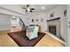 Inviting living room features a fireplace and high ceilings creating a comfortable and stylish space at 5283 Union Ct # 8, Arvada, CO 80002