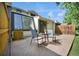 Charming patio area with table and chairs, perfect for enjoying outdoor living at 5283 Union Ct # 8, Arvada, CO 80002